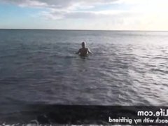 MIlf masturbating on the beach