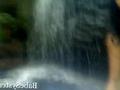 Ebony big tit chick having fun at waterfall