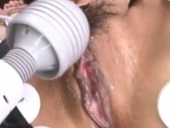 Asian girl tied down for extreme orgasm session with hitachi magic wand