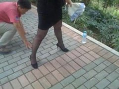 Humiliated by a lady in black dress in a park