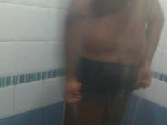 Stripping and taking shower bath nude