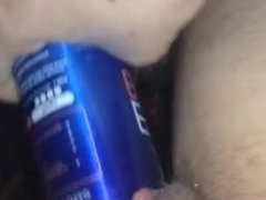 Hot british girl gets a can in her pussy.