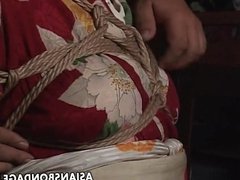 Asian mature bitch has a rope session to endure