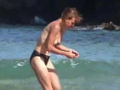 wife topless on beach with small empty saggy tits