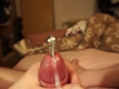 Cum through a penis plug