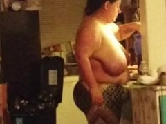 wife cooking dinner no top.