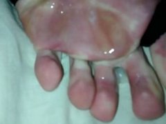 warm cum oozing from cock to stinky delicious soles
