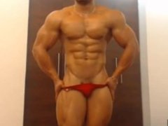 Latin muscle flexing and posing