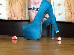 Crushing jelly bonbons with high heels