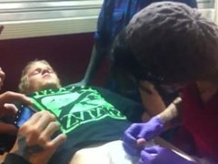 Dude putting a piercing on his dick with his friends around