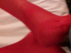 1st post. A Quick foot job video with my hot wife in Red Stockings.