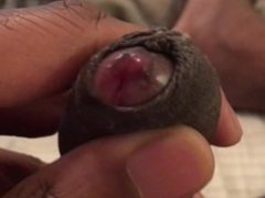 Jerking off uncut black cock with tight foreskin (phimosis)