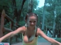 Paris Milan stretches and flashes boobs outdoors