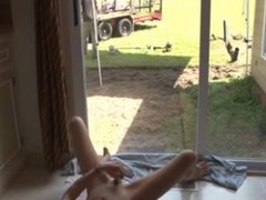squirting in front of garden worker