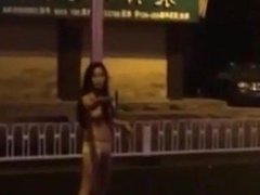 Drunken girl naked and swear on street