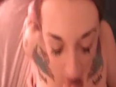 Tatted girl takes the shot in her mouth