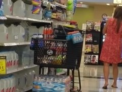 Hot milf in dress at grocery voyeur