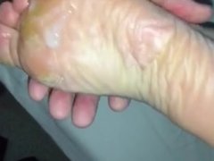 Cum on mature wife's rough soles