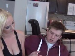 Big sister gives little brother a handjob