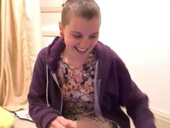 Shaved headed British girl plays with her big tricks