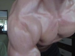 Oiled muscle flexing & posing