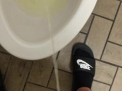 Pissing in a public restroom very very soft cock