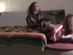 Watch a Tye Dye girl get Tickled in her Lifted Rainbow Bed