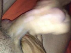 Stroking his cock while fingering his asshole