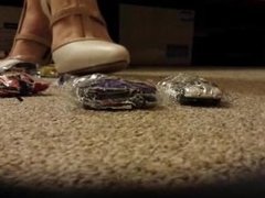 giantess Cathy destroys little toy cars in white heels