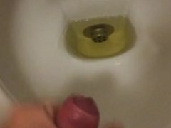Jerking and cumming in a pub's bathroom