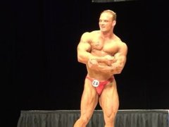 Sexy Tatted Bodybuilder Posing on Stage