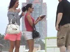 2 tourists at south beach. Albertine LIVE on 720cams.com