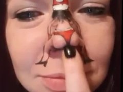 Dancing Santa on girl's nose