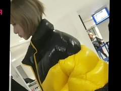 Girl in Manchester Airport in Sexy padded coat