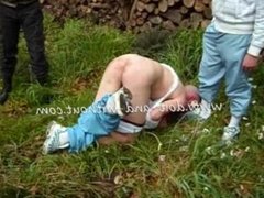 Young chav beaten and pissed on outdoors