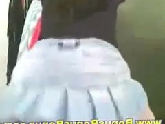 Sexy Brunette Teen Shaking Her Ass in a Short Skirt