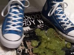 Blue Converse crush grapes on a T-Shirt