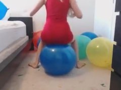 Blonde teen in tight minidress ass shaking on ballons to make them explode!