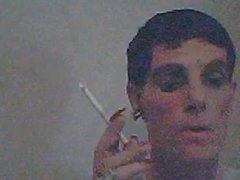 Smoking a Virginia Slim 120 with long nails but no wig