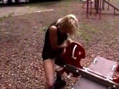 Amateur woman pissing on a swing jy