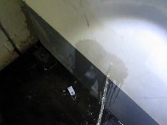 pissing in a well used corner in the parking garage