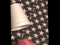 Guy cums in cup and pours it on his cock (part 1)