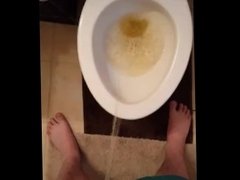 Straight guy peeing in toilet