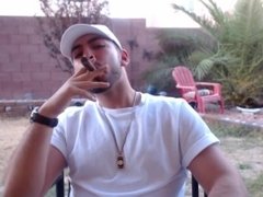 White Hat White Shirt Smoking Cigar