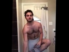 Handsome guy shows his huge dick to the camera