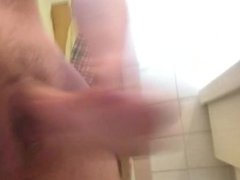Teen strokes his fat cock and plays with his balls