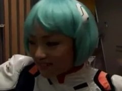 Asian Cosplayer in PVC suck and swallow