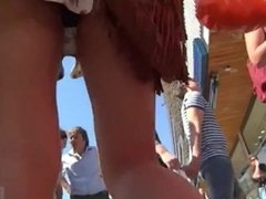 Hidden cam - Hot MILF in minidress exposes her big wet ass to all voyeurs !