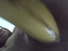 Teens tight pussy takes a big banana and dildo