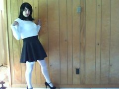 cute in black skirt and white outfit posing and riding dildo